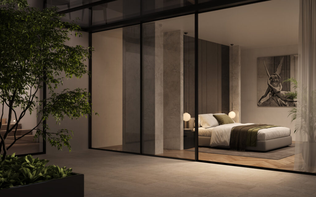 bedroom in grey color with picture of statues in love on the wall with glass door to the terrace