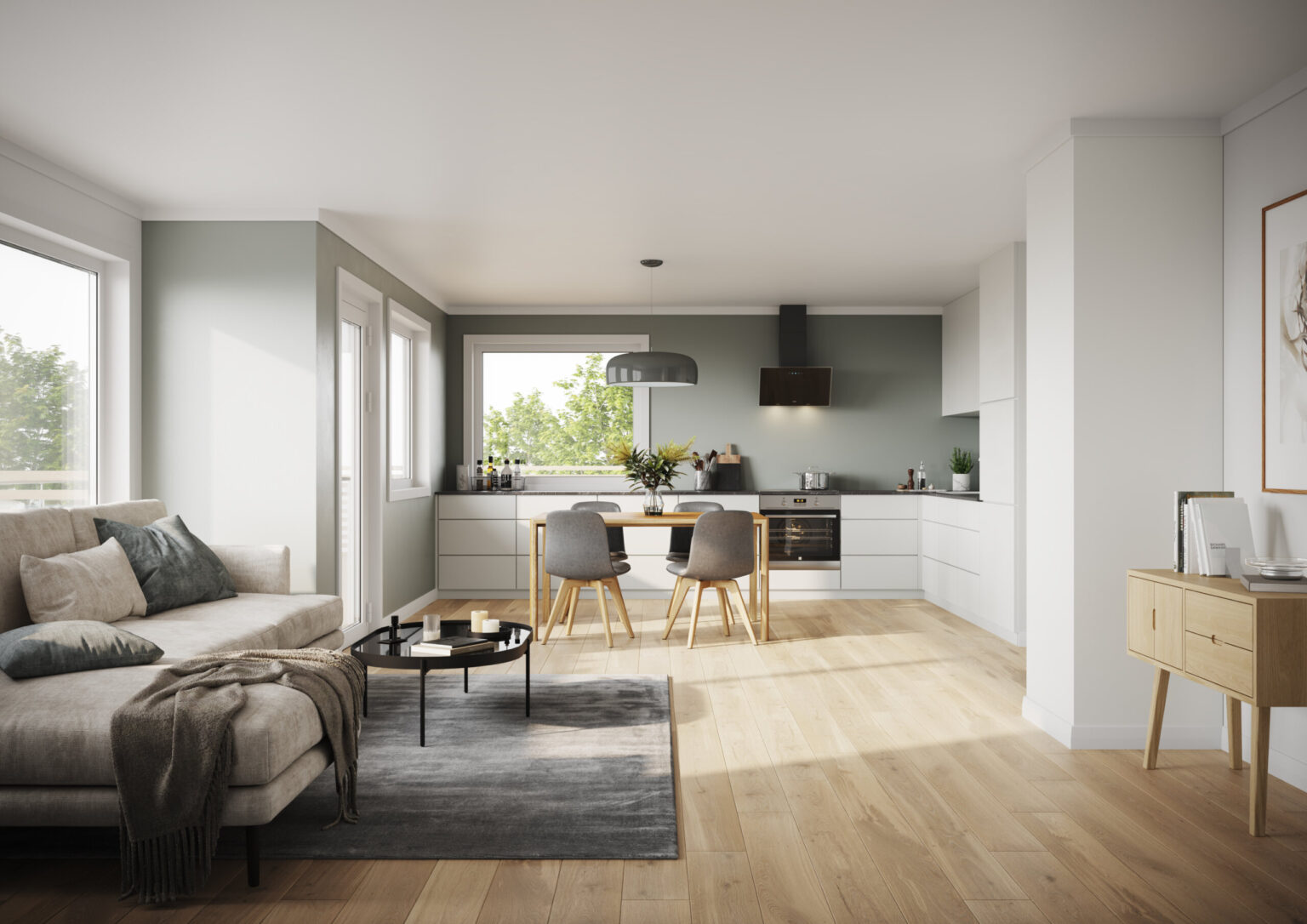White kitchen with green walls and grey sofa in daylight