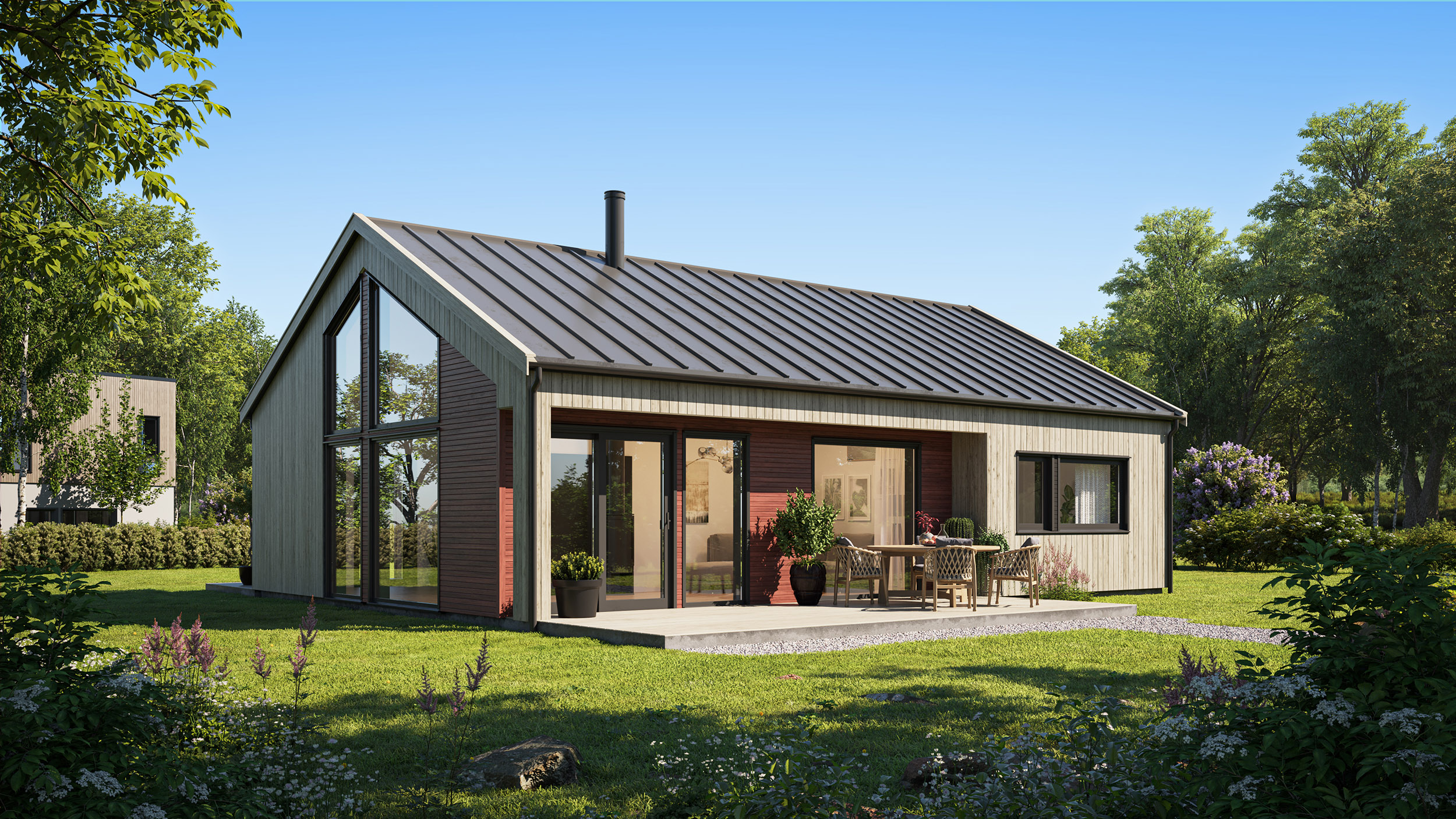 modernes Ferienhaus mit großen Fenstern und grünem Garten