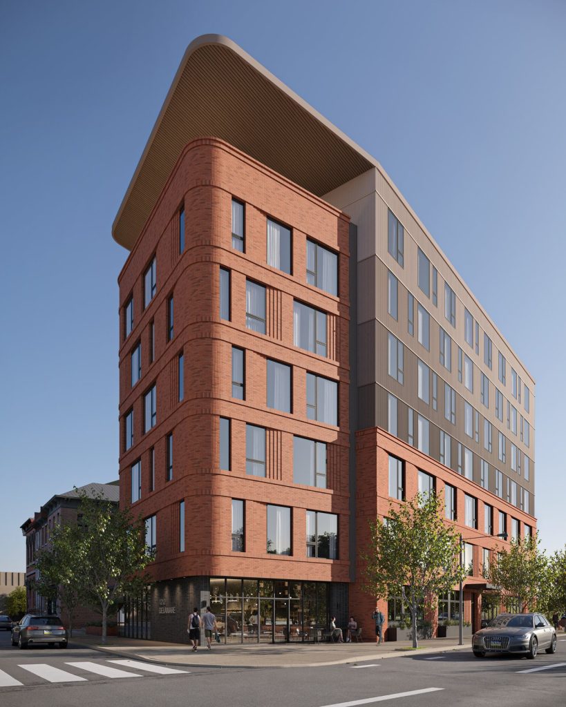 Residential rendering of a curved red-brick apartment building on a street corner