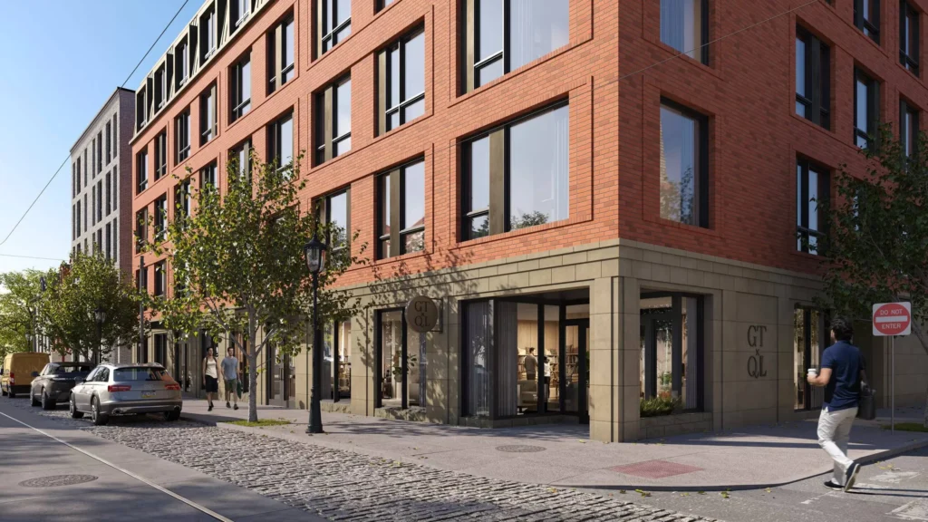 A 3D exterior render of a modern brick building on a city street