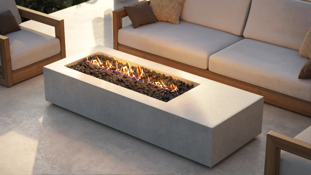 Brasero rectangulaire en béton sur une terrasse extérieure aménagée