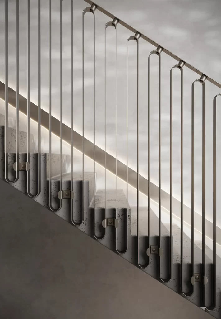 Détail rapproché d’une rampe d’escalier métallique à fixations en laiton